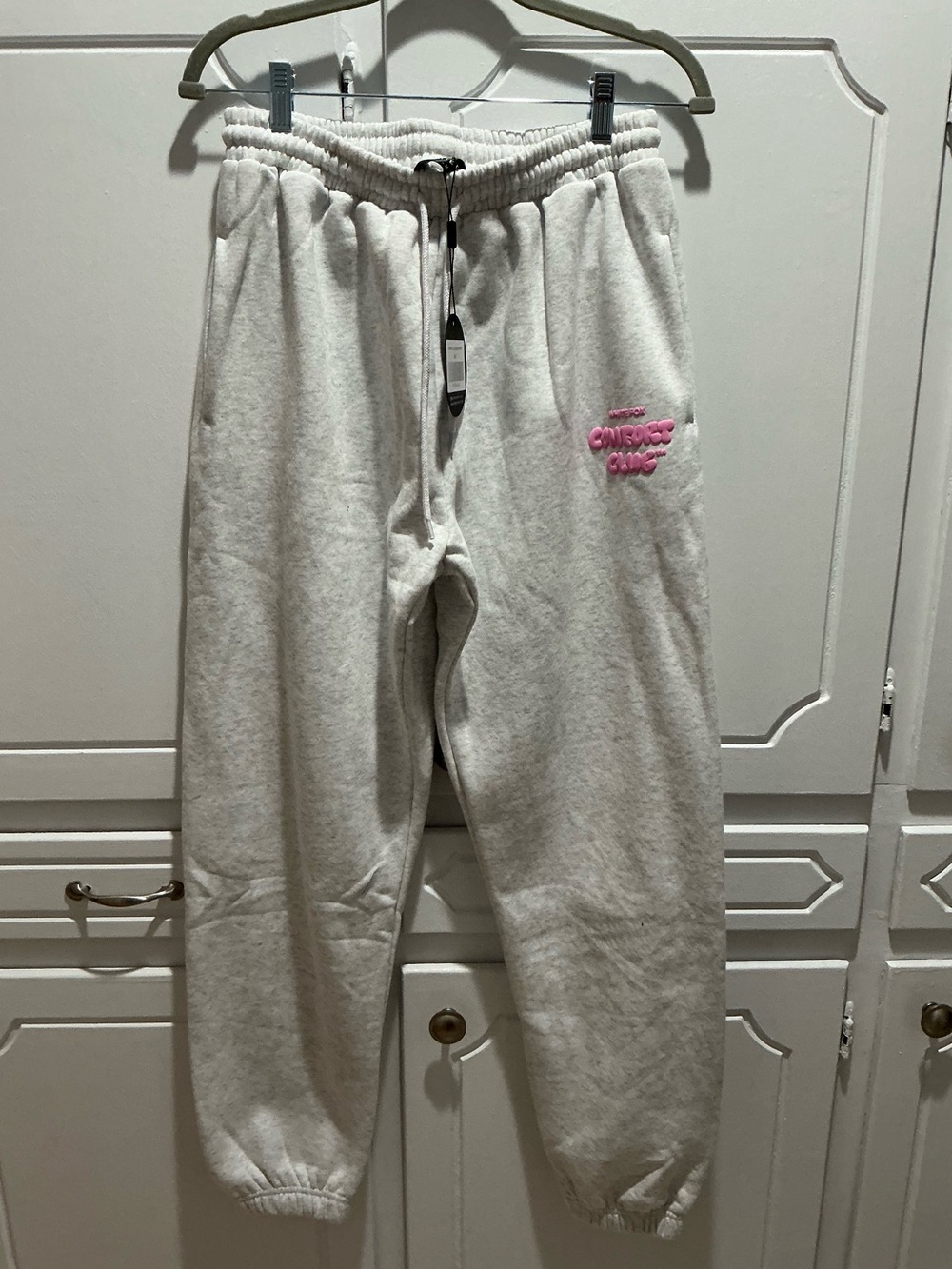 White Fox Boutique Cream Sweat Joggers with Pink Patch